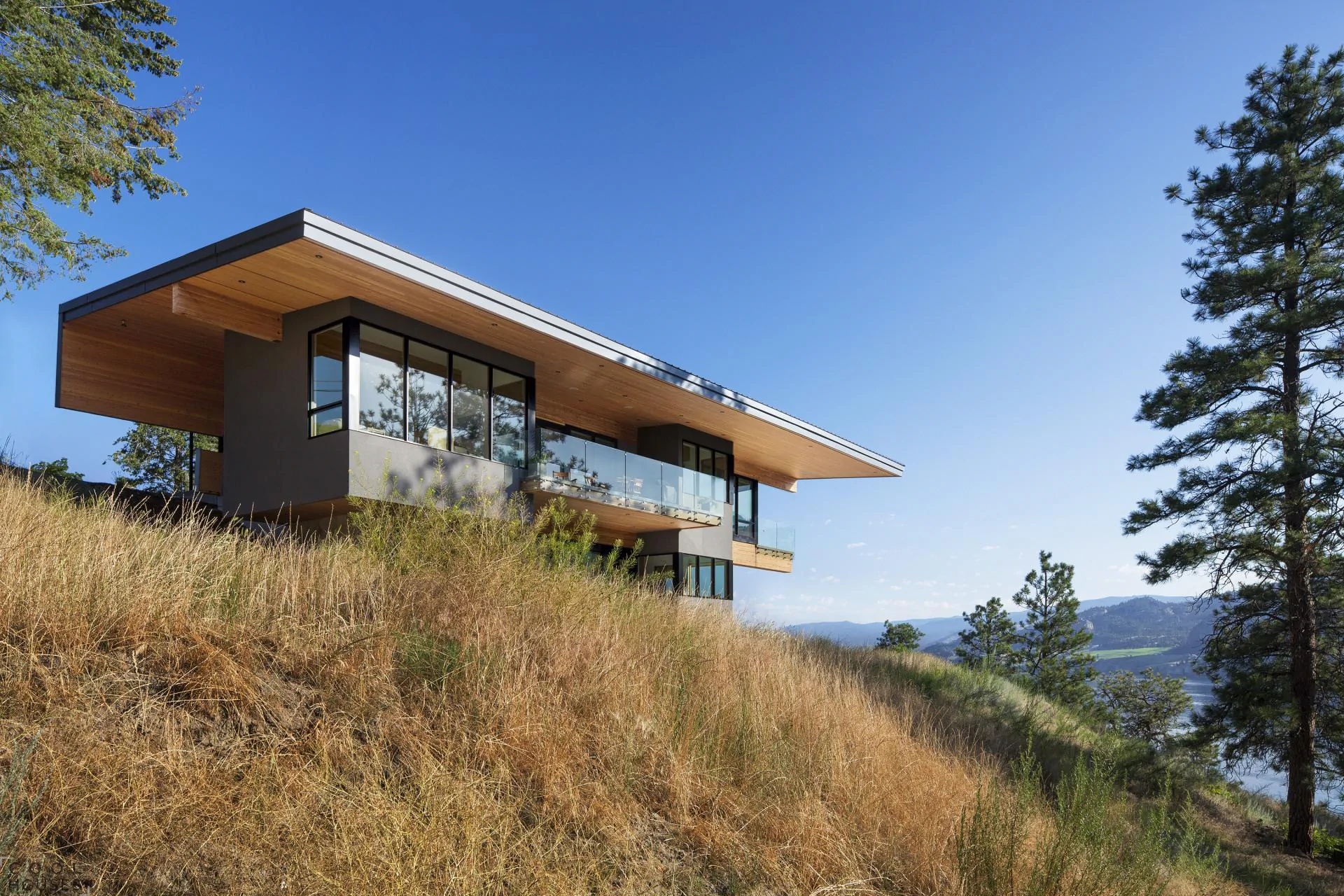 Floating Façade: Contemporary Mountain Residence with Wooden Cantilevers