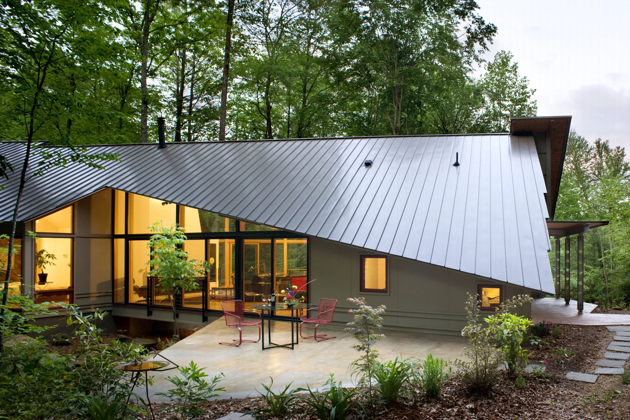 Forest House with Dynamic Metal Facade