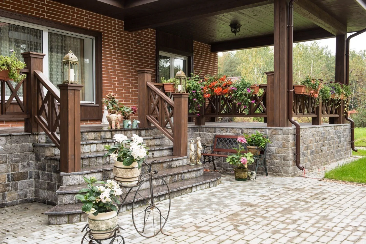 Classic Brick Facade with Wooden Porch and Stone Foundation