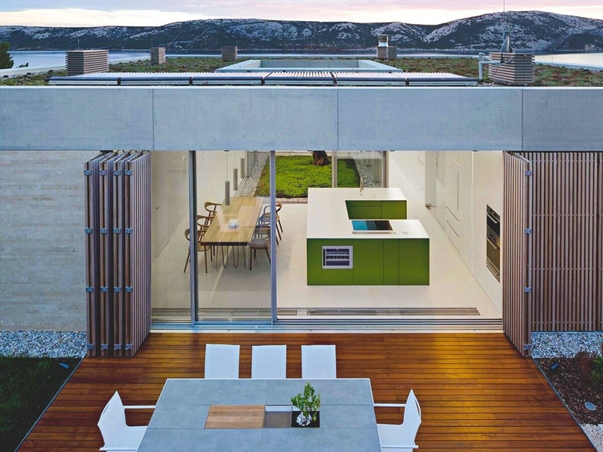 Minimalist Facade with Wooden Slats and Panoramic Glazing