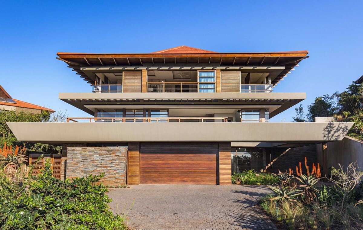 Modern three-level facade with elements of Asian aesthetics