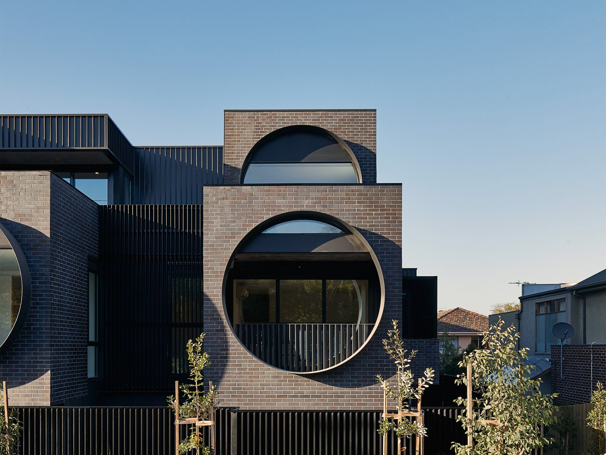 Modern Brick Facade with Circular Porthole Windows