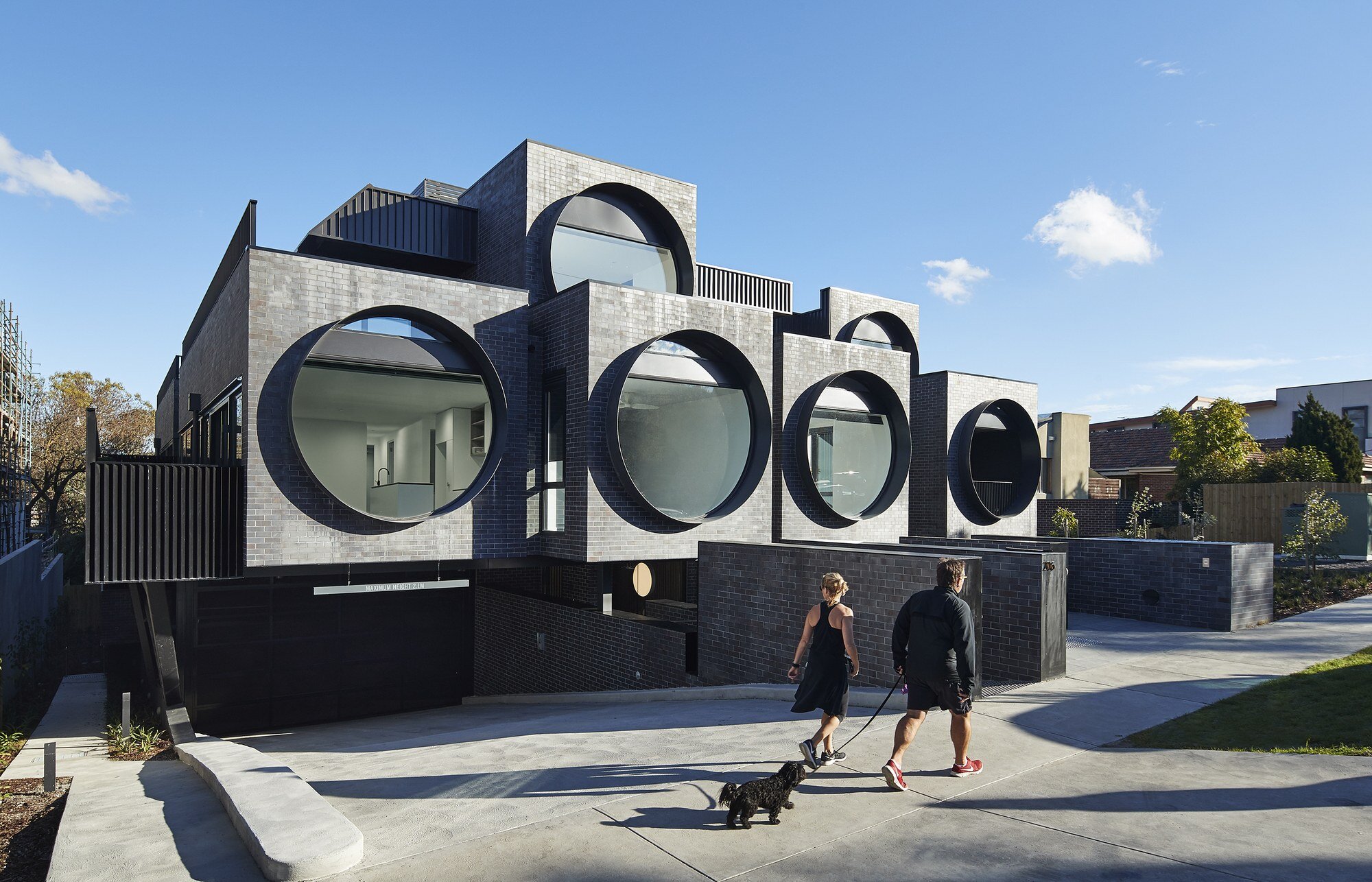 Modern Brick Facade with Circular Porthole Windows