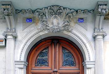 Cladding with fretwork on house facade