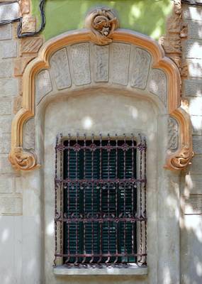 Art Nouveau Façade Window with Carved Stone Portal and Decorative Grille