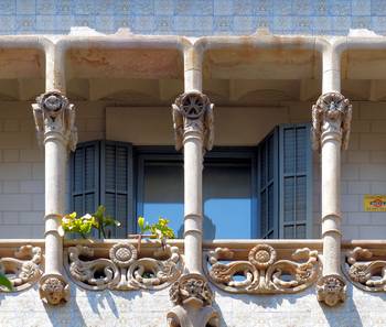 Cladding with pillars on house facade