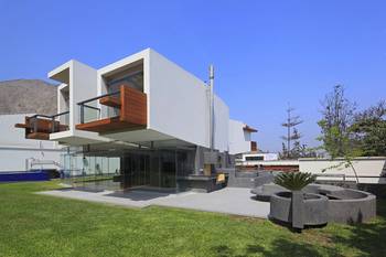 Cladding with balcony on house facade