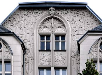 Exquisite Art Nouveau façade with rich floral decorations and sculptural elements