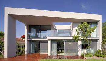 White Cubic Facade with Panoramic Glazing