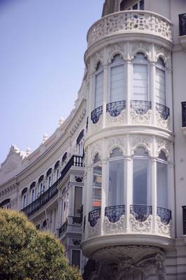 Cladding with oriel windows on house facade