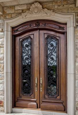 Luxurious facade with double doors: a synthesis of wood, glass, and wrought iron