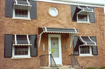 Traditional Brick Facade with Decorative Awnings