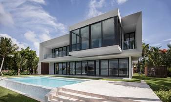 Minimalist White Facade with Panoramic Glazing: Contemporary Waterfront Villa