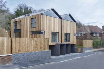 Modern Gabled House with Vertical Wooden Facade