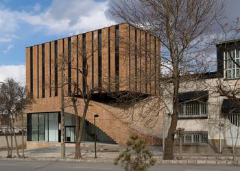 Brick Facade with Diagonal Staircase: A Dialogue of Texture and Geometry