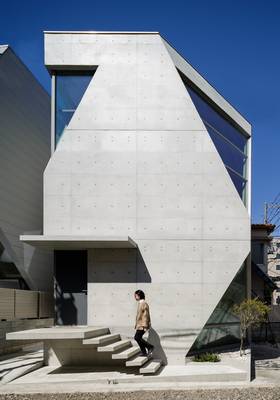 Polygonal Concrete Facade: Geometric Expression in Contemporary Brutalism