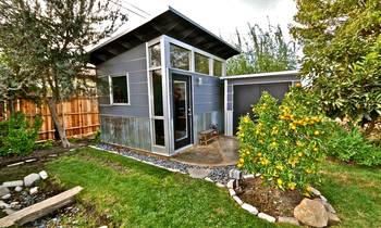 Modern Garden House with Combined Facade and Mono-Pitch Roof