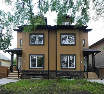 Modern Symmetrical Duplex with Contrasting Facade