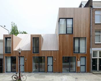 Dynamic Wooden Façade: A Contemporary Interpretation of Urban Housing