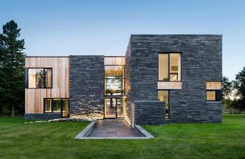 Cladding of rough stone country house