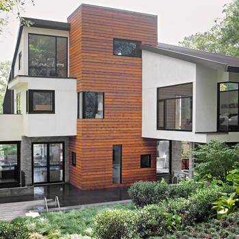 Contrasting Modern Facade with Vertical Wooden Cladding