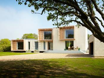 Modern Minimalist Façade with Wooden Accents