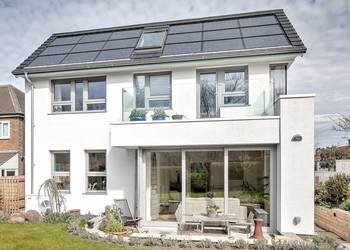 Cladding with balcony on house facade