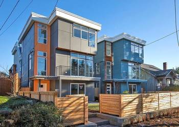 Cladding with windows on house facade