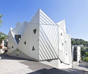 White Crystalline Facade: Deconstructivism in Urban Environment