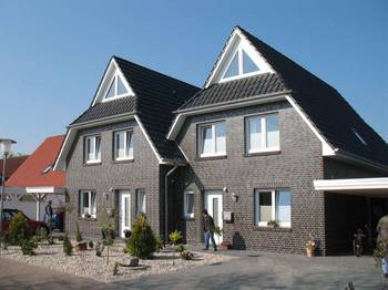 Cladding of brick country house