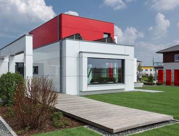 Cladding with windows on house facade