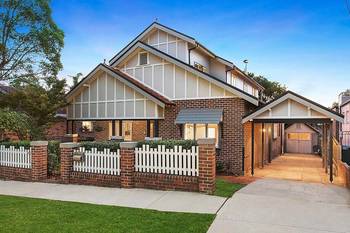 Elegant Brick Craftsman Façade with Multi-Level Composition