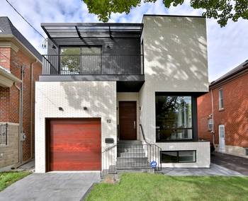 Modern Minimalist Facade: White Brick, Black Accents, and Wooden Elements