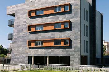 Cladding with windows on facde