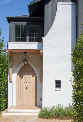 Cladding with entrances on facde