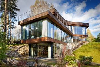Photo of glass country house