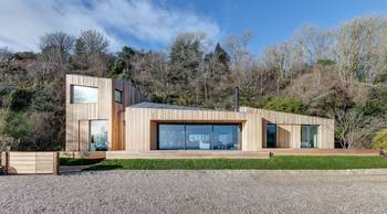 Cladding of wood country house