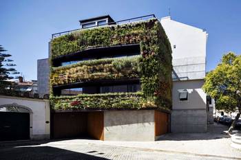 Cladding with plants on house facade