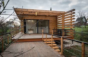 Cladding with terrace  on house