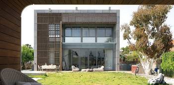 Cladding of metal country house