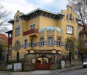 Photo of house with yellow parts