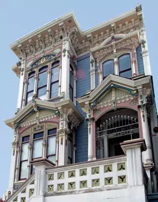 Exquisite Polychromatic Façade of a Victorian Mansion with Rich Decorative Elements