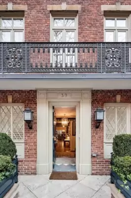 Elegant brick façade of a city mansion with classical details