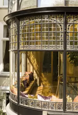 Exquisite Art Nouveau Bay Window Facade with Stained Glass