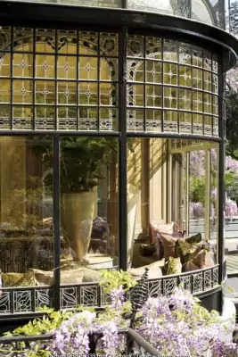 Classical Stained-Glass Facade of a Winter Garden with Semi-Circular Structure