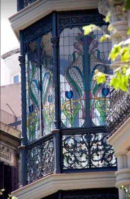 Art Nouveau Bay Window with Stained Glass: An Exquisite Element of Urban Facade