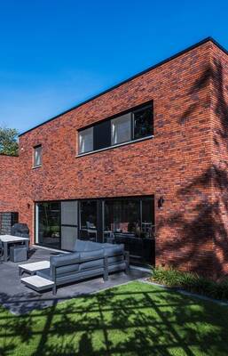 Modern Minimalist House with Textured Brick Façade