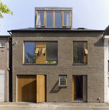 Minimalist Brick Facade with Wooden Accents