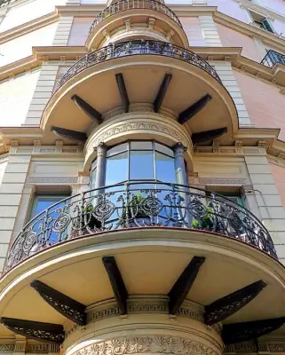 Elegant corner façade with exquisite balconies in Neo-Renaissance style