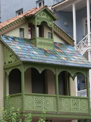 Cladding with balcony on facde